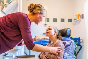 Young teen in a wheelchair receiving care in Arizona